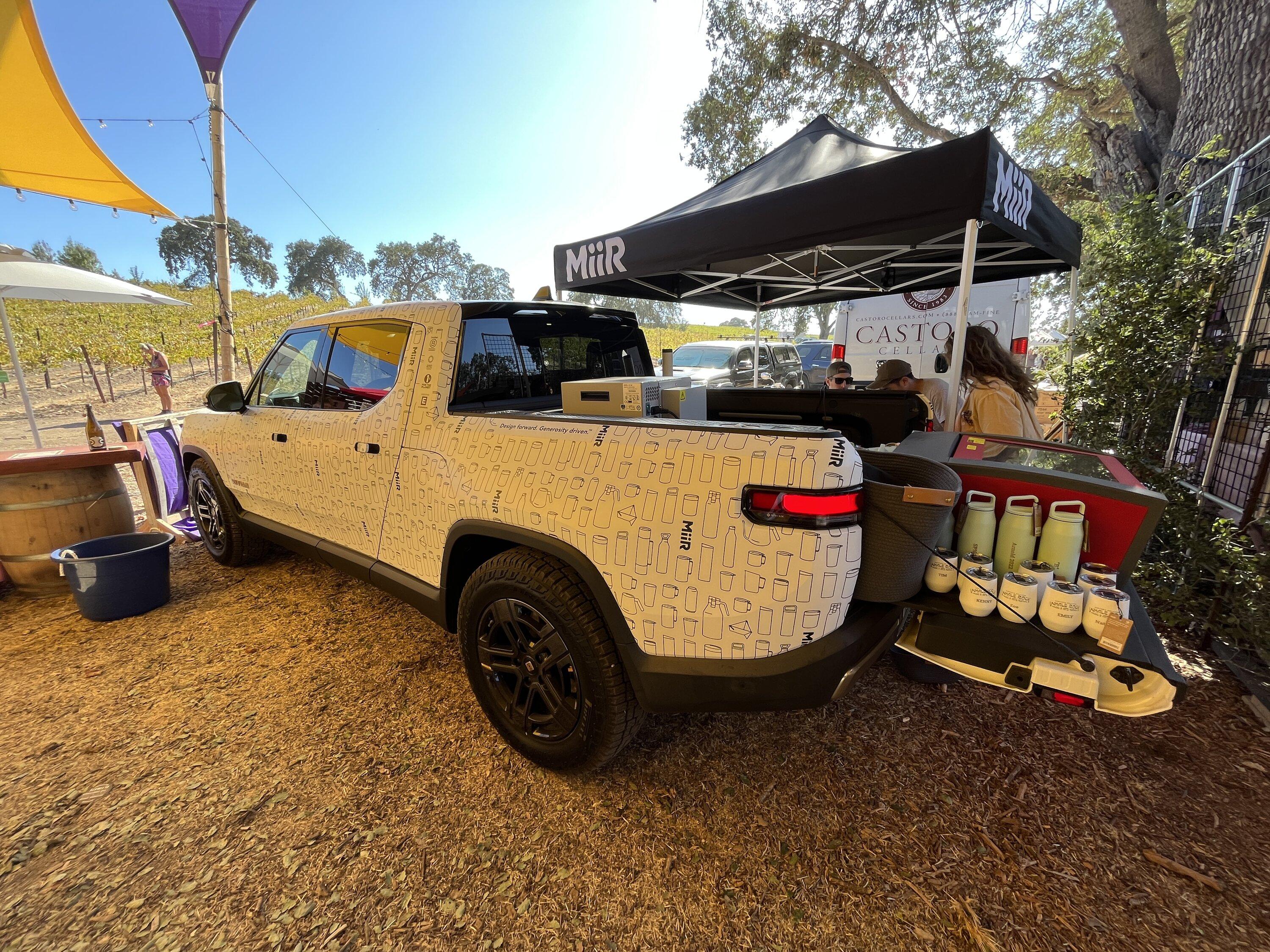 Tesla Model 2 Rivian powers laser engraver at music festival 9718D88C-43CF-44D7-92A5-9C81C279A669