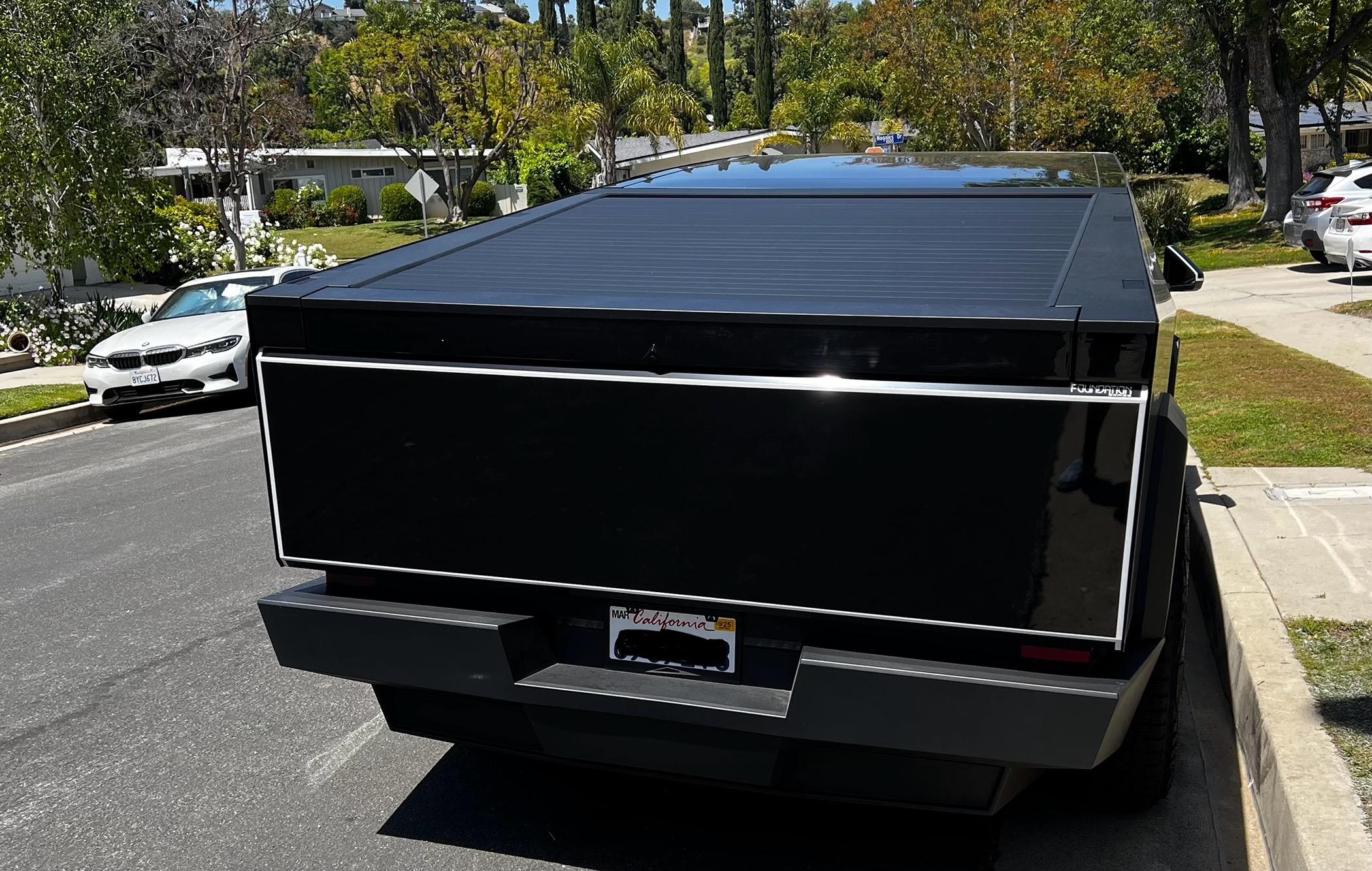 Tesla Model 2 ? Cybertruck Silhouette License Plate Frame; laser etched on stainless steel IMG_4386