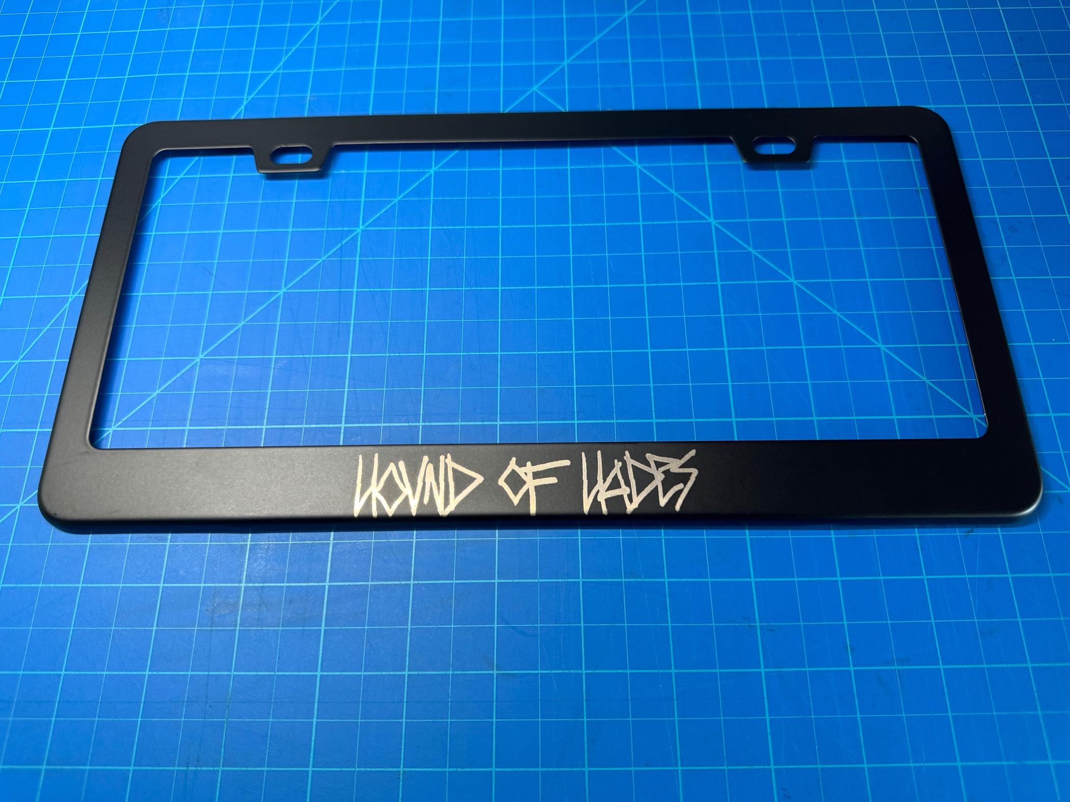 Tesla Model 2 Made a custom license plate frame: Hound of Hades IMG_6302