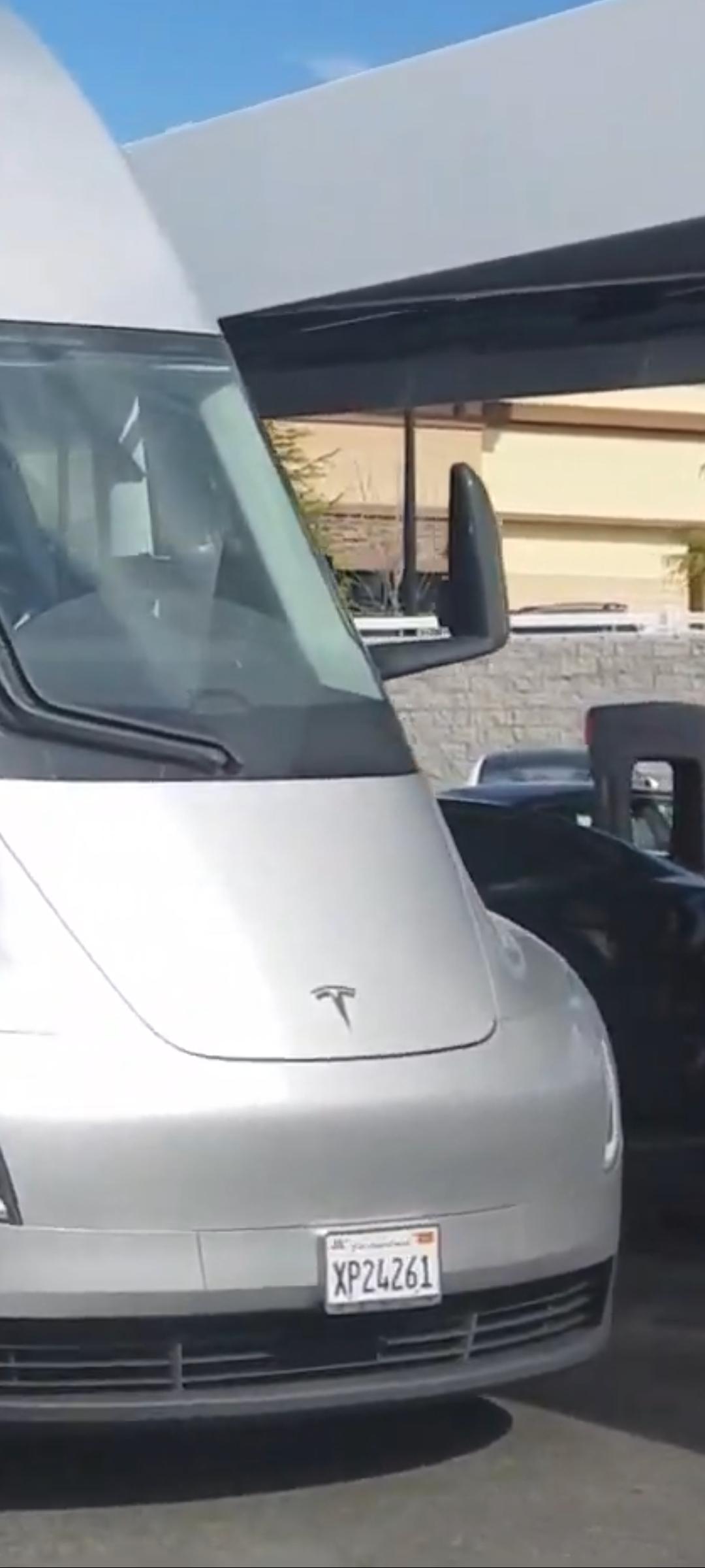 Tesla Model 2 How I want my Cybertruck delivered Semi with Teslas) Screenshot_20230108_225721_Photos