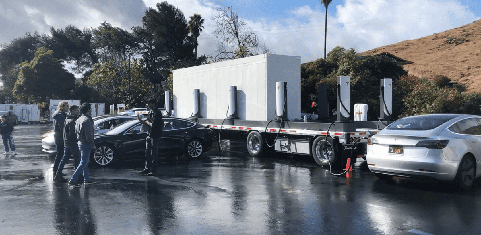 Tesla Model 2 GM Says Its Fuel Cell Generators Could Enable EV Fast-Charging TEsla-Mobile-Supercharger-e1575024891429